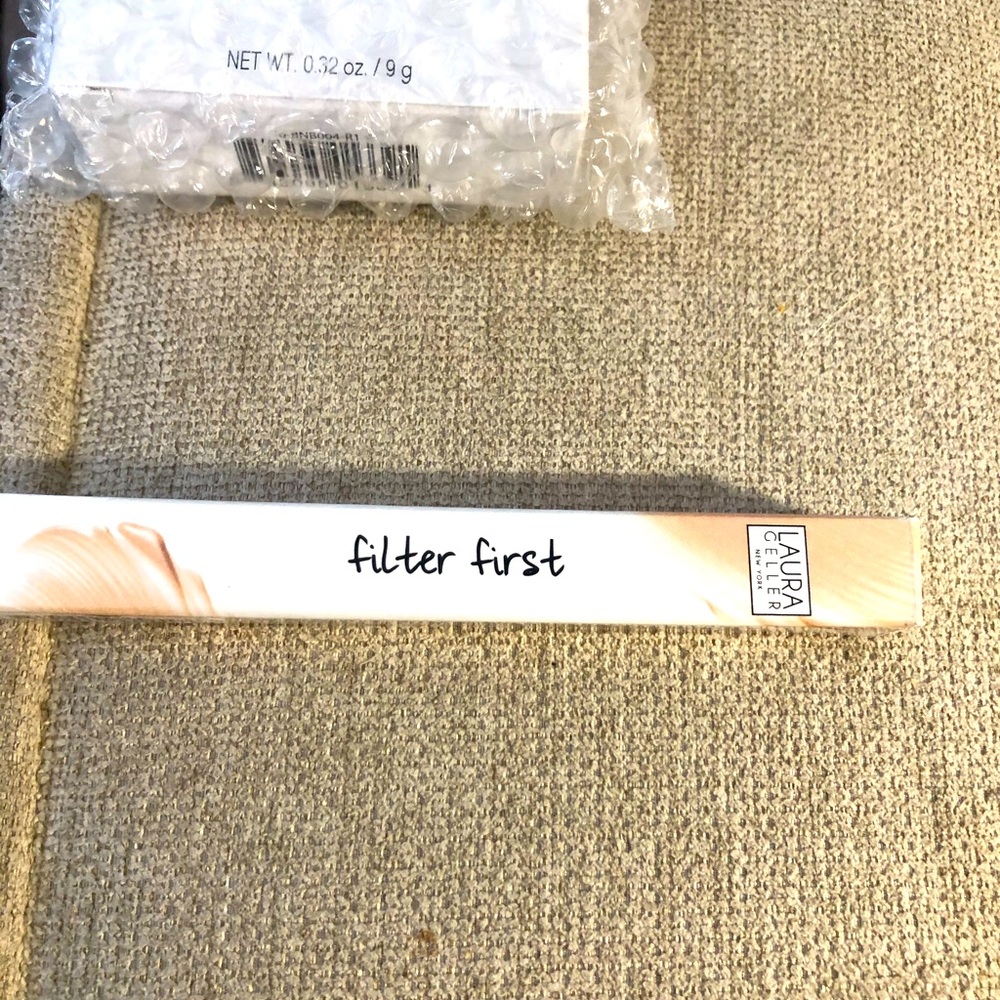 Laura Geller filter first concealer TAN